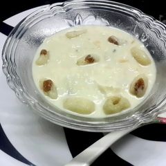 A picture of Rosho puli pithe(Coconut and Rava dumplings).