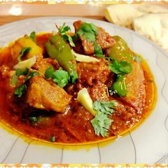 A picture of Karahi Gosht With Naan.