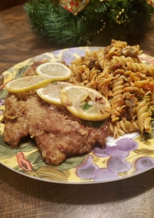 A picture of Brad's veal scallopini w/ sausage & sun dried tomato pasta.