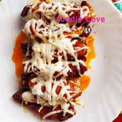 A picture of Cheesy baked honey glazed chicken wings.