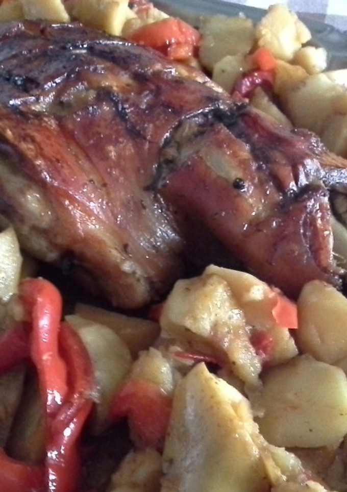 Una foto de Paletilla de cochinillo al horno
