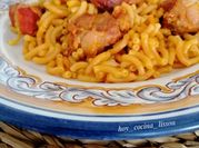Una foto de costillas adobadas en salsa