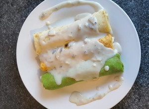 Una foto de Trilogía de canelones en masa de panqueques