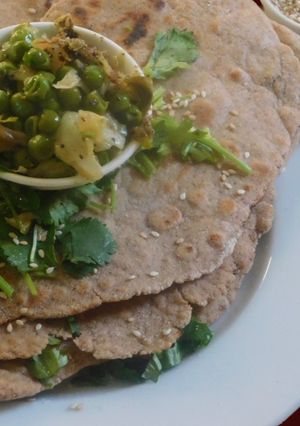 A picture of Butter Garlic Naan with rye, barley and wheat flours.