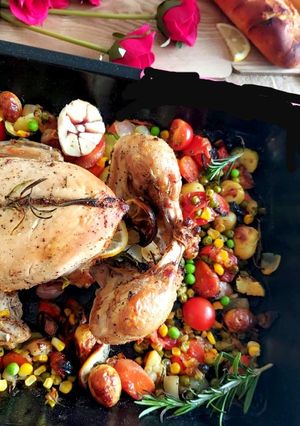 A picture of Chicken roast with veggies.