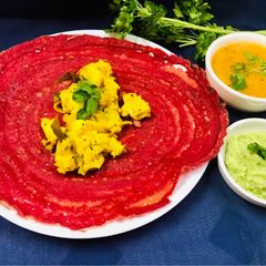 A picture of Beetroot Dosa.
