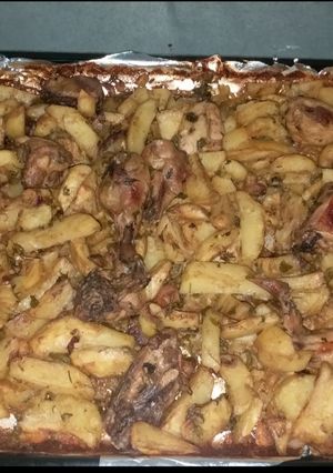 A picture of Baked chicken and potatoes.