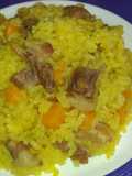 Arroz con cerdo, zanahoria y papa