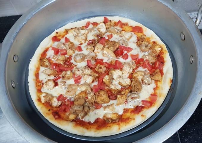 Steps to Prepare Homemade Chicken tikka pizza in lock down (karahi baking)
