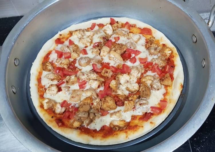 Recipe of Ultimate Chicken tikka pizza in lock down (karahi baking)