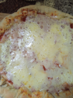 Una foto de Pizza rellena,#Cumplimos 9 años