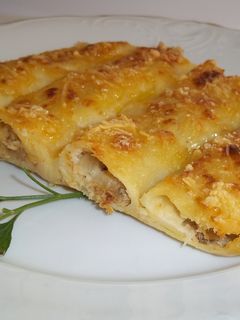 Una foto de Canelones con carne de cocido
