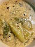 Thakurbarir Niramish Jhinge Alooer Doodh Jhol (No Garlic Onion- Potato & Ridge Gourd Stew With Milk)