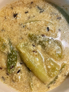 A picture of Thakurbarir Niramish Jhinge Alooer Doodh Jhol (No Garlic Onion- Potato & Ridge Gourd Stew With Milk).
