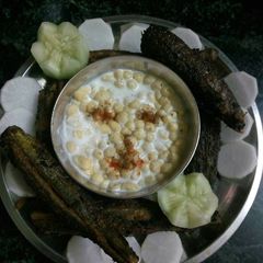 A picture of Bharwa karele with boondi rayta.