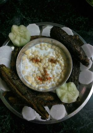 A picture of Bharwa karele with boondi rayta.