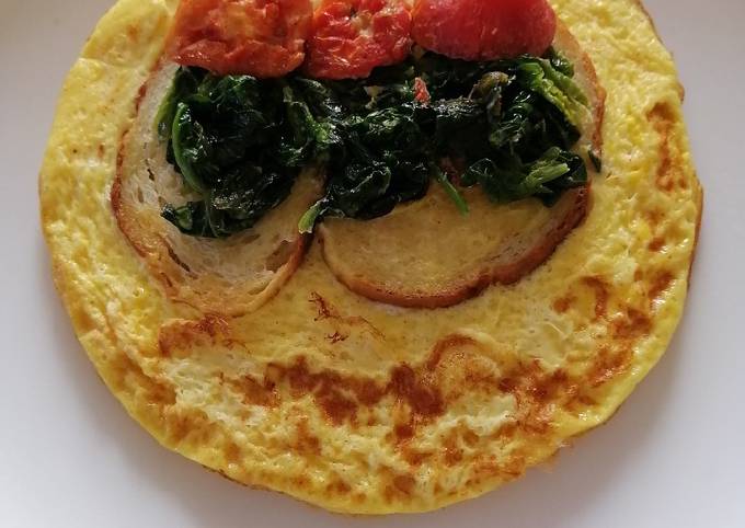 Омлет со шпинатом, помидорами и гренками