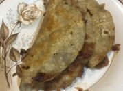 Una foto de taco de cecina