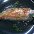 Merluza con aderezo de tomates