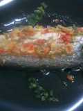 Merluza con aderezo de tomates