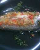 Merluza con aderezo de tomates