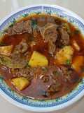 Aalu gosht (mutton/beef)