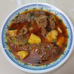 Aalu gosht (mutton/beef) A picture of Aalu gosht (mutton/beef).