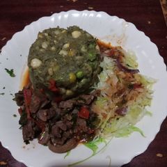 A picture of Mukimo steamed cabbage beef.