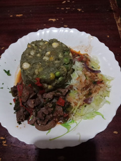 A picture of Mukimo steamed cabbage beef.