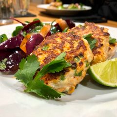 A picture of Thai Salmon fishcakes with Asian dressed salad.