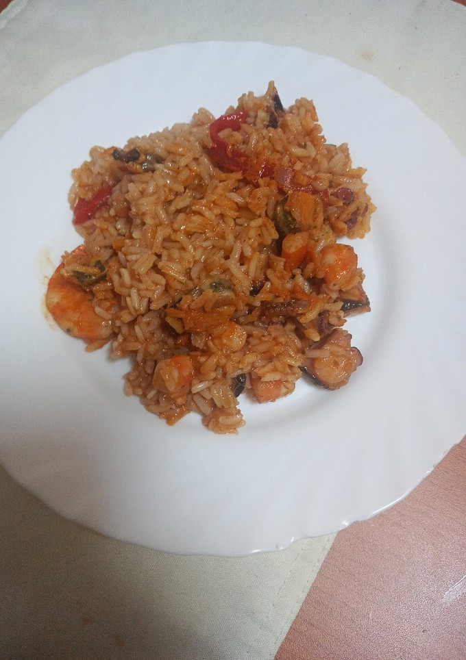 Una foto de Arroz con pulpo, langostinos y mejillones