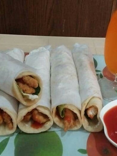 A picture of Zinger Shawarma with homemade pita bread❤😋.