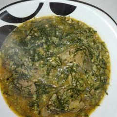 A picture of Okro soup with okazi.