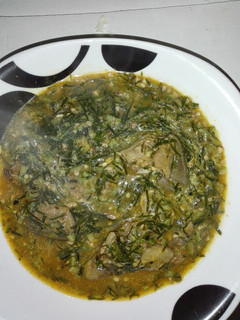 A picture of Okro soup with okazi.