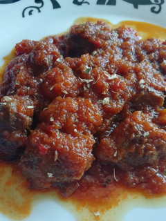 Una foto de Carrillera con salsa de caramelo