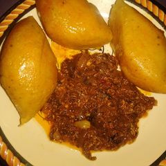 A picture of Moi moi with egg sauce.