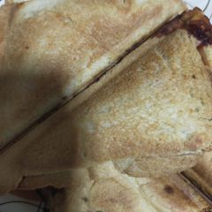 A picture of 3 spice bread sandwich.