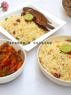 A picture of Velencia rice with chicken and beef soup.