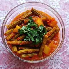 A picture of Drumsticks and Potato Curry.