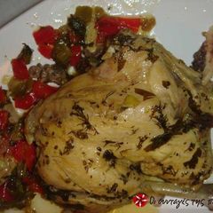 A picture of Chicken with oil and oregano.