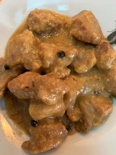 Una foto de Magro de cerdo en salsa de ajo y cebolla