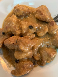 Una foto de Magro de cerdo en salsa de ajo y cebolla