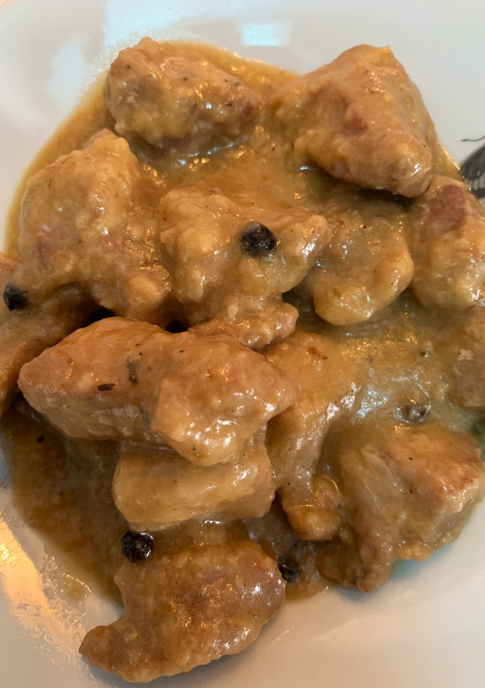 Una foto de Magro de cerdo en salsa de ajo y cebolla