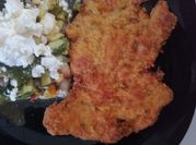 Una foto de milanesas a la mostaza