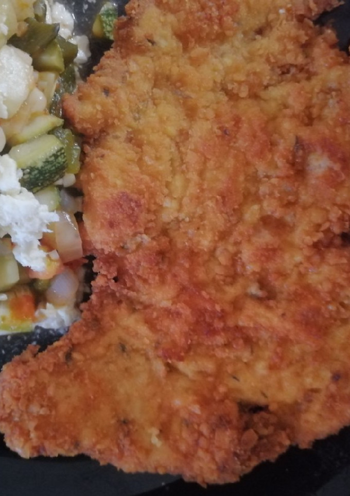 Una foto de Milanesas con mostaza y hierbas