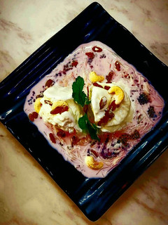 A picture of Dry Fruit Vanilla Ice cream with Kolah.