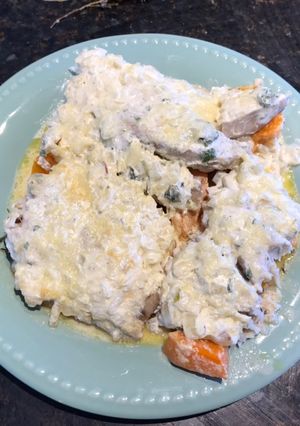 Una foto de Pescadilla al horno sobre colchón de zapallo