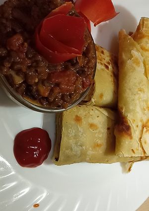 A picture of Leftover chapatis and brown ndengus.