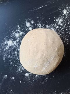 Una foto de Masa pizza con ajo y orégano