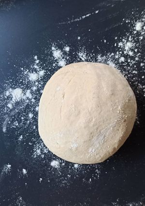 Una foto de Masa pizza con ajo y orégano